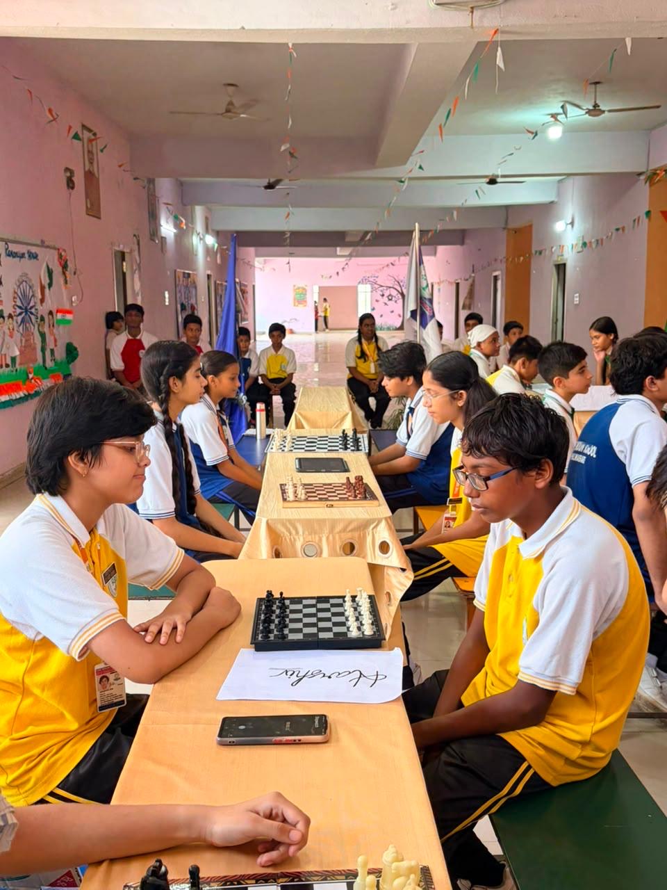 Students participating in chess